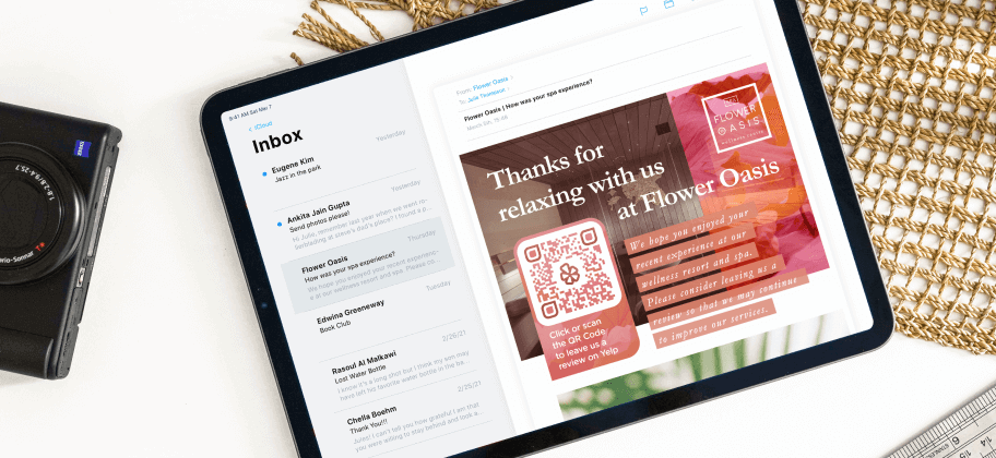 An iPad with an open email from a wellness resort featuring a Yelp QR Code.